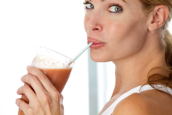 Woman drinking smoothie